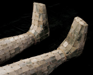 Jade burial suit of Liu Sheng (with 9 body plugs and a gilt-bronze headrest inlaid with jade)