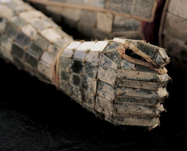 Jade burial suit of Liu Sheng (with 9 body plugs and a gilt-bronze headrest inlaid with jade)