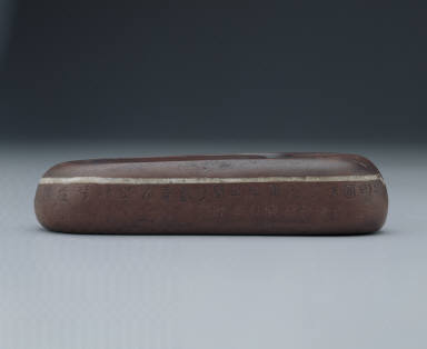Inkstone with jade-belt-like band and inscription attributed to Wen Tian-xiang(1236-1282)