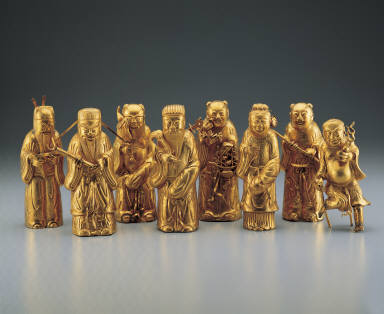 Gold sculpture of The Eight Immortals