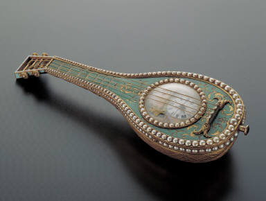 Champleve pocket watch in the shape of dombira