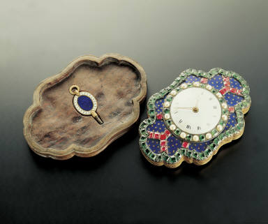 Champleve belt plaques inlaid with pearls, jewels and clock
