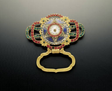 Champleve belt plaques inlaid with pearls, jewels and clock