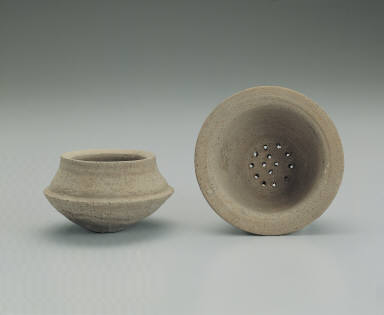 Pottery zheng vessel and pottery fo vessel
