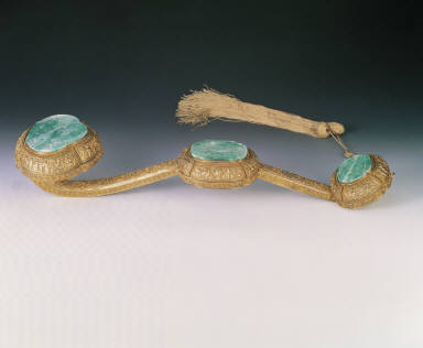Gilt ru-yi scepter with jade inlays on the medallions and decorations of assorted auspicious motifs on the shaft