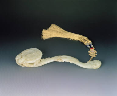 Jade ru-yi scepter with decorations of the auspicious qing (an ancient musicial instrument) and fish motifs