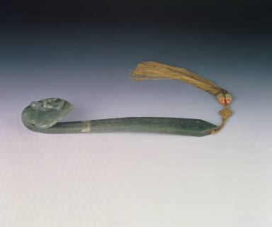 Dark green jade ru-yi scepter, decorated with the well-wishing motifs of bat and God of Longevity