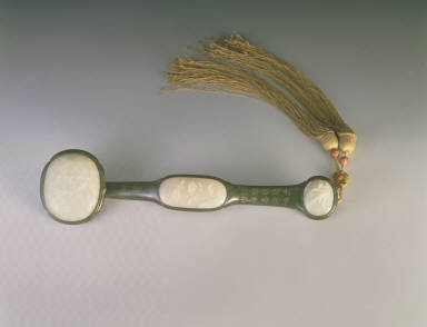 Dark green jade ru-yi scepter, with medallions inlaid with white jade and shaft inscribed with Emperor Jia-Qing's poem of 1804