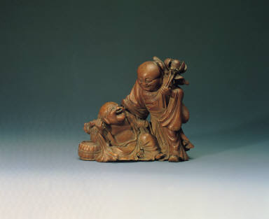 Bamboo carving of the auspicious motif of two monks in harmonious union