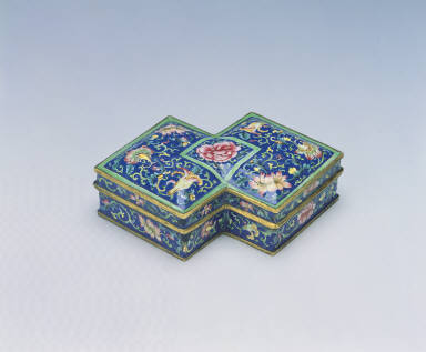 Joined square boxes of painted enamel