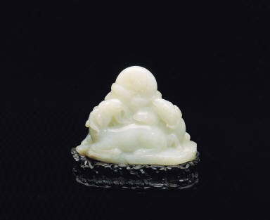 Jade carving of the auspicious sheep and phoenix motifs
