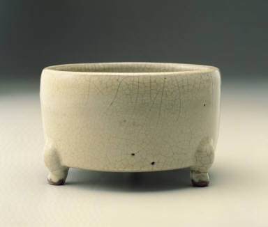 A tripod incense burner