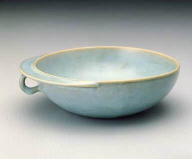 A sky-blue single-handled washer