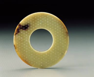 Jade inscribed disc with grain patterns