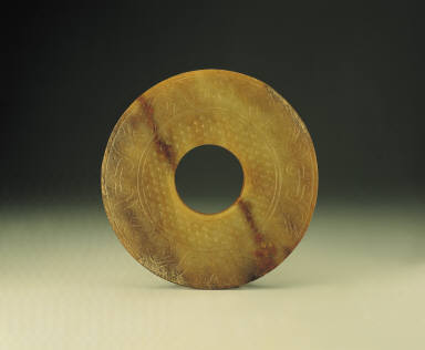 Jade disc with animal motif