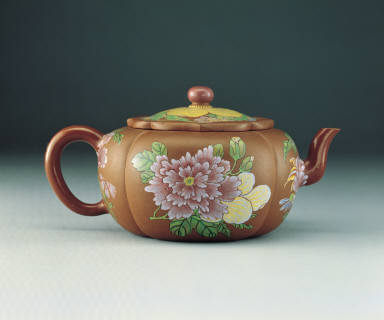 A Yixing teapot painted with famille rose