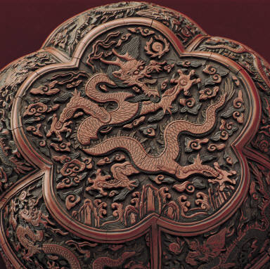 Carved polychrome lacquer box in the shape of plum-blossom with cloud dragon decor