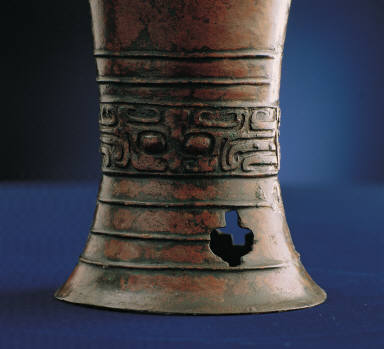 Bronze Gu vessel with animal mask decor