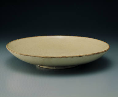 Large dish with impressed floral design