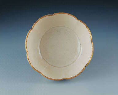 Warming bowl with incised floral design in white glaze