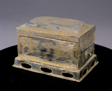 Gilt silver tea sieve with apsaras and crane amidst cloud design