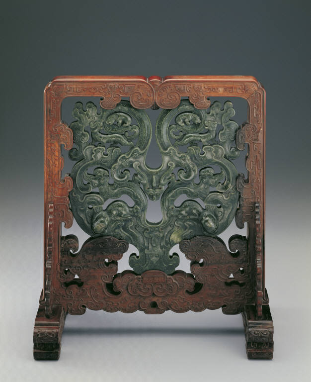 Wood stand with jade plague