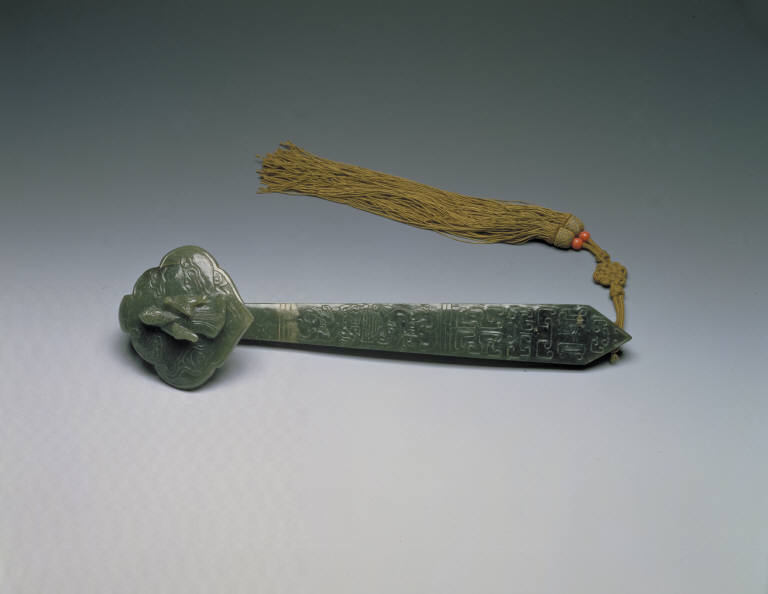 Dark green jade ru-yi scepter, decorated with the well-wishing motifs of bat and God of Longevity